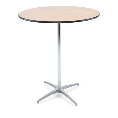 Round cocktail table with a wood top and a tall metal pole